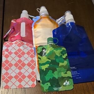 5 refillable collapsible water bottles